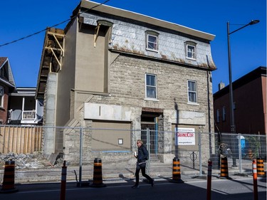 Repairs to Magee House at 1119 Wellington Street West continue but the sidewalk remains closed. October 15, 2019.