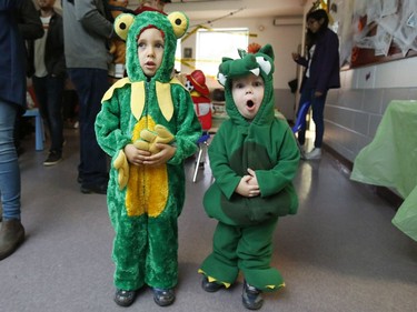 Dominik, 4, a frog, and Simon, 2, a dragon, pose for a photo at the Westcliffe Community Association Annual Halloween Party.
