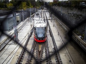 A train pulls in to Tunney's Pasture station. Delays, jammed doors, unreliable bus connections: There must be a better way.