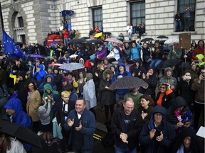 LONDON, ENGLAND - OCTOBER 19: Protesters react to the news that MPs voted for the Letwin amendment during the "Together for the Final Say" march  on October 19, 2019 in London, England. Thousands have taken to the streets of London demanding a referendum to give the British public the final say on the Brexit. The march coincides with a rare Saturday sitting of Parliament, during which MPs debated the Prime Minister's new Brexit deal.