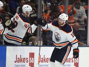 NEW YORK, NEW YORK - OCTOBER 08: James Neal #18 of the Edmonton Oilers scores his hat-trick goal on the power-play at 6:31 of the third period against the New York Islanders at NYCB's LIVE Nassau Coliseum on October 08, 2019 in Uniondale, New York. (Photo by Bruce Bennett/Getty Images)