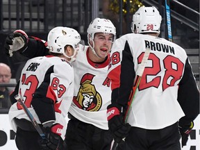 Tyler Ennis #63, Jean-Gabriel Pageau #44 and Connor Brown #28 of the Ottawa Senators celebrate after Pageau scored a third-period goal against the Vegas Golden Knights on Thursday night. There's been talk of putting Pageau on the power play, but coach D.J. Smith is worried about playing him too much.