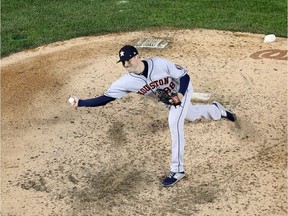 WASHINGTON, DC - OCTOBER 27:  Joe Smith #38 of the Houston Astros delivers the pitch against the Washington Nationals during the eighth inning in Game Five of the 2019 World Series at Nationals Park on October 27, 2019 in Washington, DC.