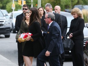 Shawna Button arrives at the memorial for her late husband Thomas Roberts at the Ottawa Police Association, October 07, 2019.