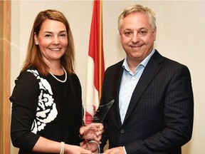 Information Commissioner Caroline Maynard presents the Information Commissioners Award to Canadian Security Intelligence Service director David Vigneault. Photo courtesy of CSIS