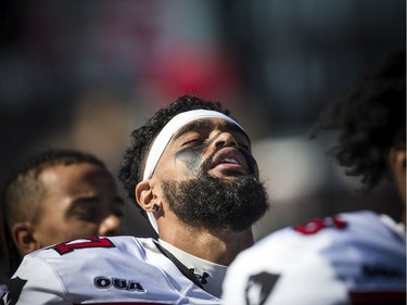 Ravens #87 Chad Manchulenko during the national anthem Saturday.