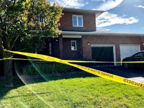 Police tape surrounds a house on Benson Street. Two people were sent to hospital after an early morning shooting on Sunday, October 20, 2019.