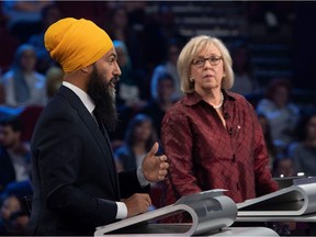 NDP leader Jagmeet Singh (L) and Green Party leader Elizabeth May take part in the federal leaders French language debate Oct. 10, 2019.
