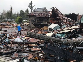 Damaged houses caused by weather patterns from Typhoon Hagibis are seen in Ichihara, Chiba prefecture on October 12, 2019.