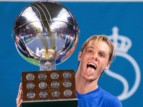 Canadas Denis Shapovalov poses with his trophy after winning the ATP Stockholm Open tennis tournament following his victory against Serbias Filip Kranjinovic on October 20, 2019 in Stockholm.