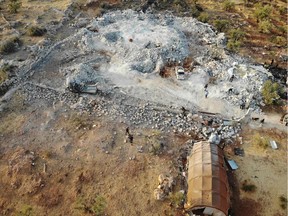 An aerial view taken on on October 27, 2019 shows the site that was hit by helicopter gunfire which reportedly killed nine people near the northwestern Syrian village of Barisha in the Idlib province along the border with Turkey, where "groups linked to the Islamic State (IS) group" were present, according to a Britain-based war monitor with sources inside Syria. - The helicopters targeted a home and a car on the outskirts of Barisha, the Syrian Observatory for Human Rights said, after US media said IS leader Abu Bakr al-Baghdadi was believed to be dead following a US military raid in the same province. Observatory chief Rami Abdel Rahman said the helicopters likely belonged to the US-led military coalition that has been fighting the extremist group in Syria.