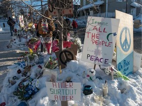 Messages are placed near a mosque that was the location of a shooting spree in Quebec City on Jan. 31, 2017. Alexandre Bissonnette was charged on Jan. 30, 2017, with six counts of murder in the attack.