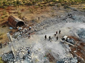 An aerial view taken on October 27, 2019 shows the site that was hit by helicopter gunfire which reportedly killed nine people near the northwestern Syrian village of Barisha in the Idlib province along the border with Turkey, where "groups linked to the Islamic State (IS) group" were present, according to a Britain-based war monitor with sources inside Syria.