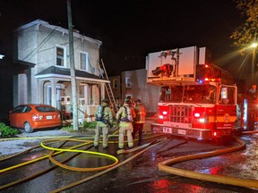Firefighters on scene at 131 Balsam St. early Tuesday morning. A family was displaced and a pet dog was killed in the incident.