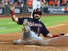 Washington Nationals right fielder Adam Eaton (2) scores a run against the Houston Astros during the eighth inning in game seven of the 2019 World Series at Minute Maid Park. Mandatory Credit: Troy Taormina-USA TODAY Sports ORG XMIT: USATSI-419409