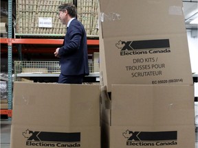 A file photo shows Chief Electoral Officer Stéphane Perrault at the Elections Canada distribution centre in Ottawa on Aug. 29.