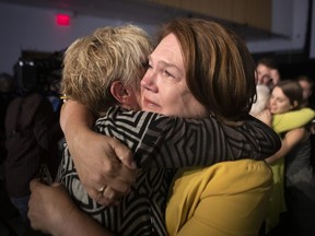 Defeat for a federal politician means losing a job, social standing and structured daily life. Cellphones get cut off, the paycheques stop, logins won't work and everyone wants them moved out fast. Independent candidate Jane Philpott is hugged by a supporter following her concession speech after losing her Markham-Stouffville seat to Liberal candidate Helena Jaczek in the 2019 Federal Election, on Monday, Oct. 21, 2019.