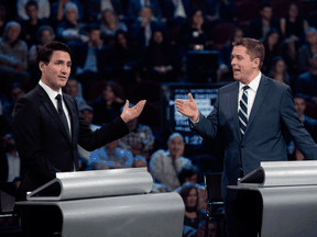Conservative Leader Andrew Scheer and Liberal Leader Justin Trudeau argue a point at the English-language leaders' debate on Oct. 7, 2019.
