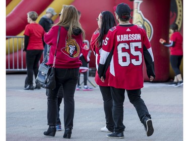 Fans make their way in to the CTC for the Ottawa Senators home opener against the New York Rangers.