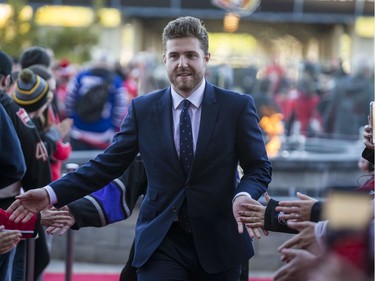 Ottawa Senators Chris Tierney greets fans as he walks the red carpet.