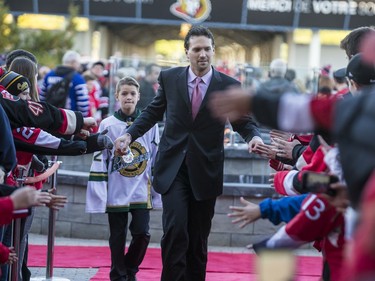 Ron Hainsey greets fans as he walks the red carpet.