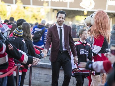 Scott Sabourin greets fans as he walks the red carpet.