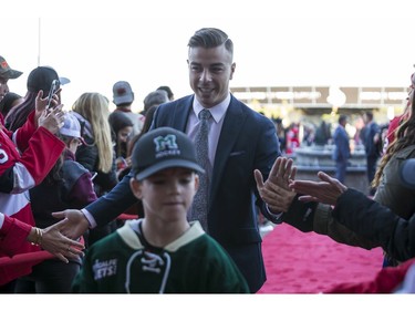 Jean-Gabriel Pageau greets fans as he walks the red carpet.