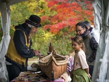 Anishinabe Nibin, or "Algonquin summer," was celebrated in Gatineau Park on Saturday, Oct. 12, 2019, where people could learn more about the traditional Algonquin way of life, as well as a chance to see artisans at work. Ron Tenasco speaks with the public.   Ashley Fraser/Postmedia