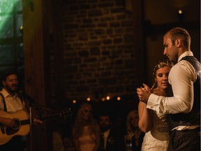 Singer-songwriter Mark Fossen performing at a wedding.