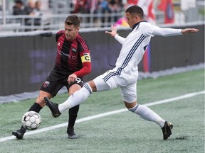 Ottawa Fury FC's Carl Haworth tries to get past a Bethlehem Steel FC player during a United Soccer League Championship game at TD Place stadium on Saturday, Oct. 12, 2019. The game ended in a 1-1 tie. Steve Kingsman / Freestyle Photography / Ottawa Fury FC