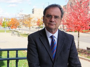 Queen's University interim provost and vice-president (academic) Tom Harris outside Richardson Hall in Kingston on Wednesday. (Steph Crosier/The Whig-Standard)