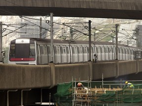 A file photo of an MTR Corp. train heads towards the Kowloon Bay station in Hong Kong, China, on March 13, 2007.