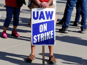 A sign is seen during a rally outside the shuttered General Motors Lordstown Assembly plant during the United Auto Workers national strike in Lordstown, Ohio, September 20, 2019. (REUTERS/Rebecca Cook/File Photo)