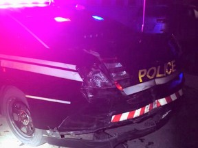 An OPP officer was 'lucky' to escape serious injury when a car crashed into a RIDE checkpoint early Saturday. A 23-year-old man faces a number of charges.