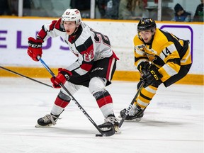 Marco Rossi of the Ottawa 67's and Jordan Frasca of the Kingston Frontenacs.