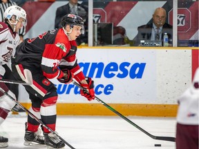 The Ottawa 67's Hudson Wilson looks up ice against the Peterborough Petes at TD Place arena on Friday, Oct. 18, 2019.