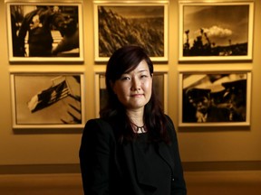 Japanese curator Eriko Kimora poses for a photo at the National Art Gallery of Canada in Ottawa Wednesday Oct 9, 2019.