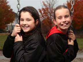 Juliet Murphy (left) and Darcy Power pose for a photo at Furness Park in Ottawa Tuesday Oct 22, 2019. Juliet and Darcy found a 60-year-old man who'd suffered a cardiac arrest at Amarillo Drive and Lydia Way, in Barrhaven Saturday and got help.