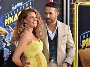 Blake Lively and Ryan Reynolds at the Detective Pikachu red carpet in May 2019 revealing they were expecting.