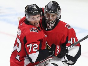 Thomas Chabot hugs goalie Craig Anderson after the buzzer ends the third period as the Ottawa Senators beat the Tampa Bay Lightning 4-2 in NHL action at the Canadian Tire Centre. Photo by Wayne Cuddington / Postmedia