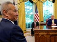 China's Vice Premier Liu He looks on during a meeting with U.S. President Donald Trump in the Oval Office of the White House in Washington, U.S., October 11, 2019.
