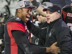 Ottawa Redblacks quarterback Henry Burris (1) and head coach Rick Campbell after winning the   CFL Grey Cup  in Toronto, Ont. on Sunday November 27, 2016.
