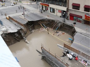 A June 2016 file photo shows an overhead view of the sinkhole that developed on Rideau Street, near the Rideau Centre.