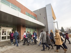 Elementary and secondary teachers begin a work to rule campaign on Tuesday. Elementary teachers at Broadview Avenue Elementary Public School gathered outside the school at 9:00am and then walked in together in a show of solidarity in their dispute with the province.