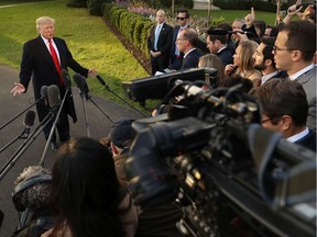 U.S. President Donald Trump talks to journalists outside the White House on Nov. 4.
