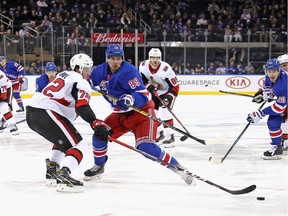 Pavel Buchnevich of the New York Rangers attempts to get past Thomas Chabot of the Ottawa Senators during the second period at Madison Square Garden on Monday in New York City.
