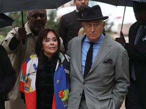 WASHINGTON, DC - NOVEMBER 12: Roger Stone, the former advisor to President Donald Trump, arrives with his wife Nydia Stone (L), on the second week of his trial  on November 12, 2019 in Washington, DC. Stone has been charged with lying to Congress and witness tampering.