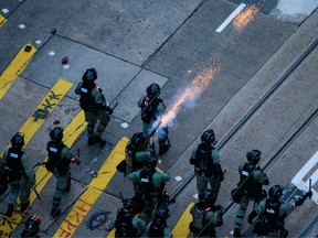 Police fire tear gas to disperse protesters in the Causeway Bay area of Hong Kong on November 11, 2019.