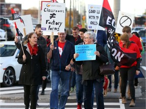 Protest on Merivale Rd in Ottawa by teachers who are in contract negotiations and fighting increases to class sizes, October 25, 2019.