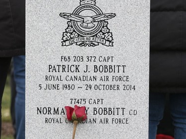 A rose lays on a tombstone during the Remembrance Day Ceremony at the National Military Cemetery, November 11, 2019.